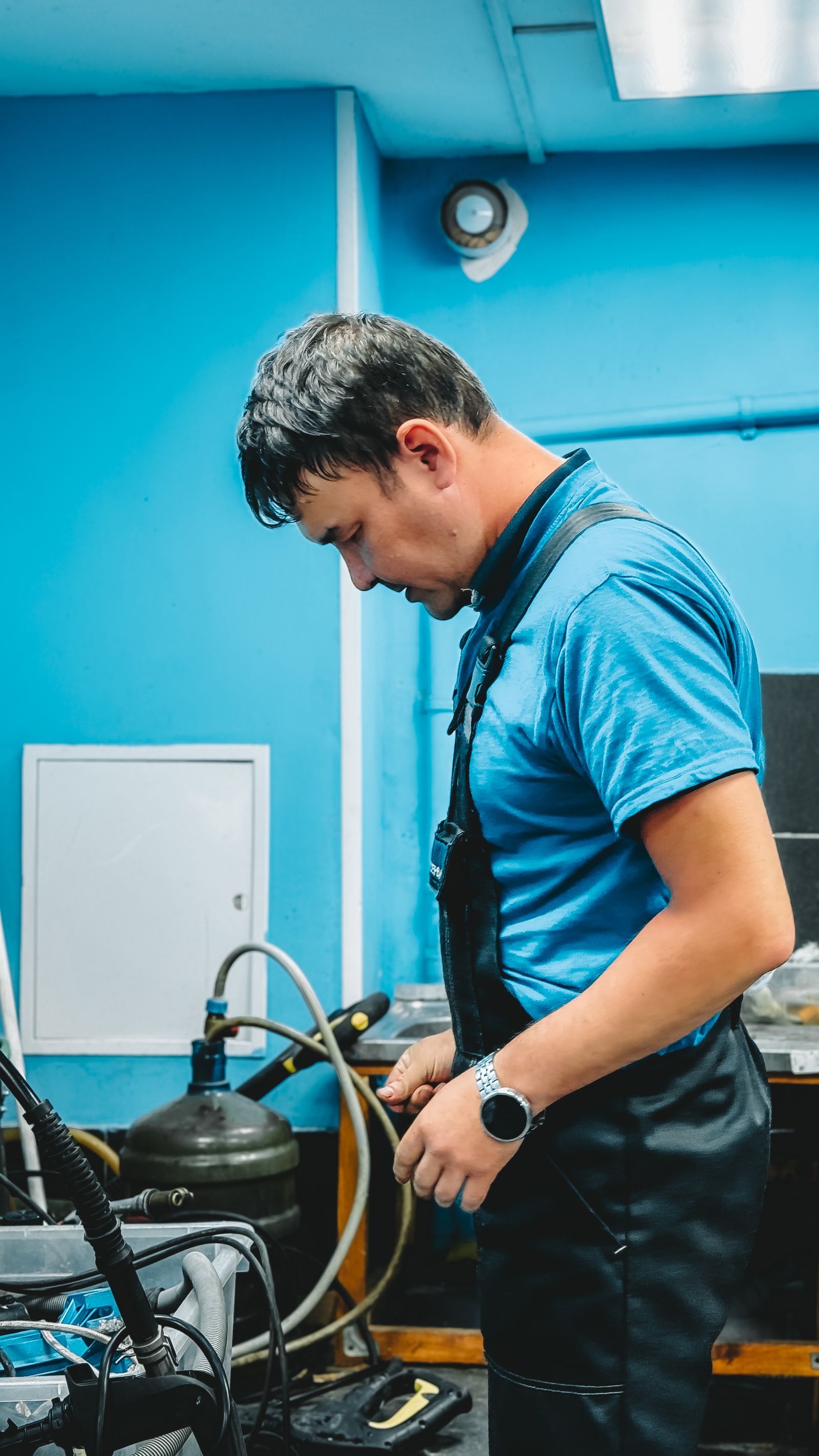 Liberty Plumbing worker in workshop
